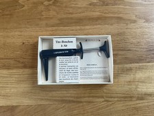 Tire Bouchon à Air Comprimé